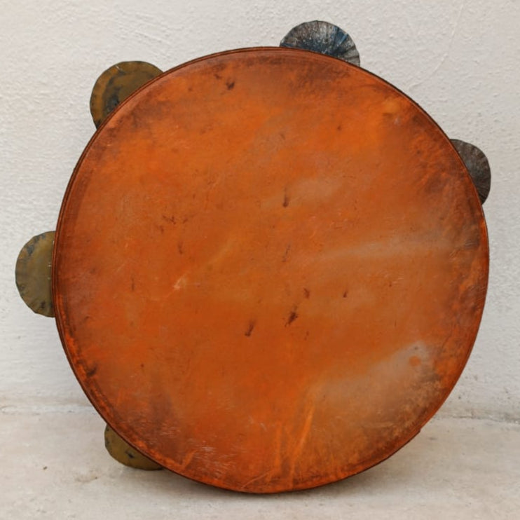 Close-up of hand-dyed red goatskin drumhead