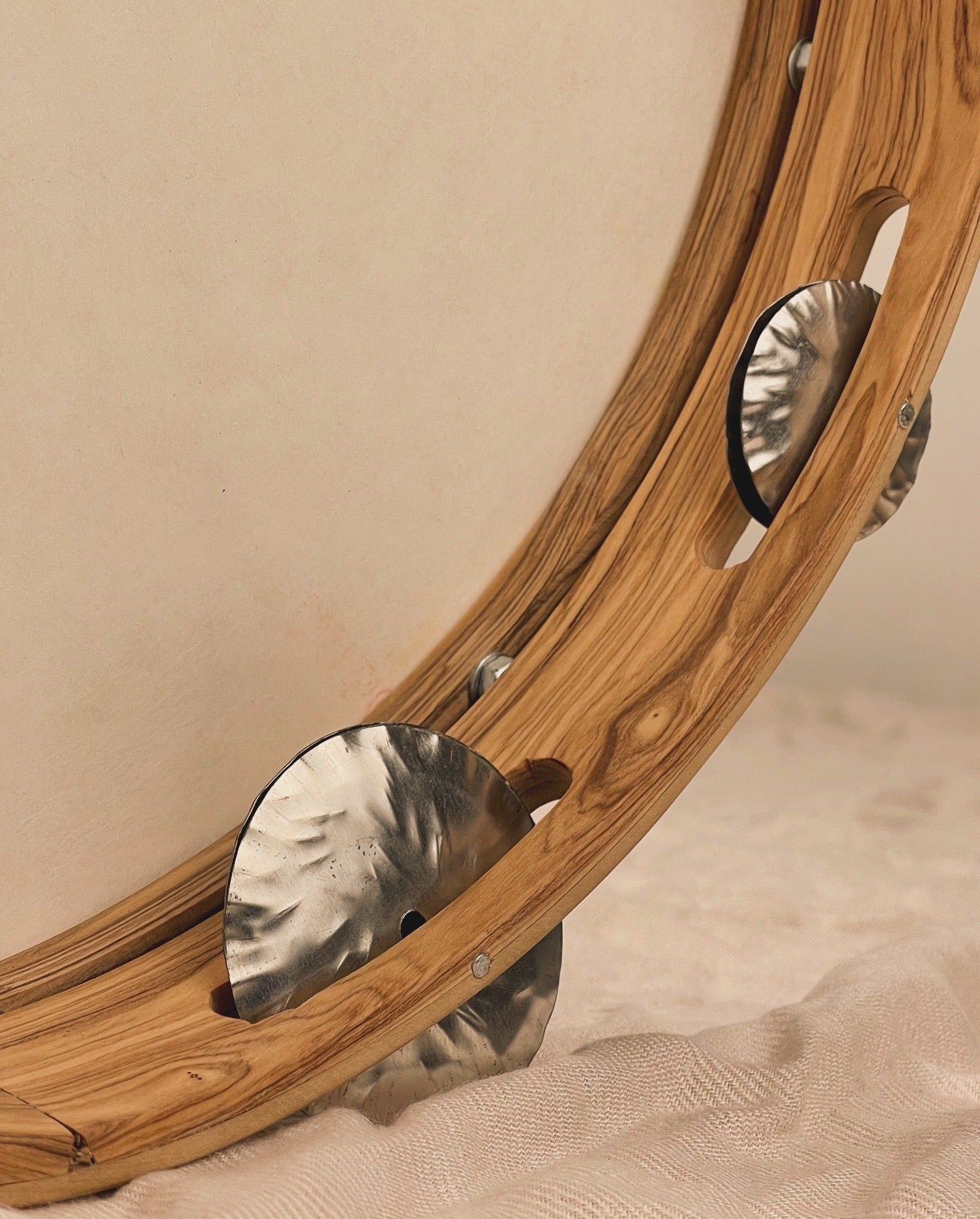 Close-up of interchangeable jingles on 30 cm tambourine frame