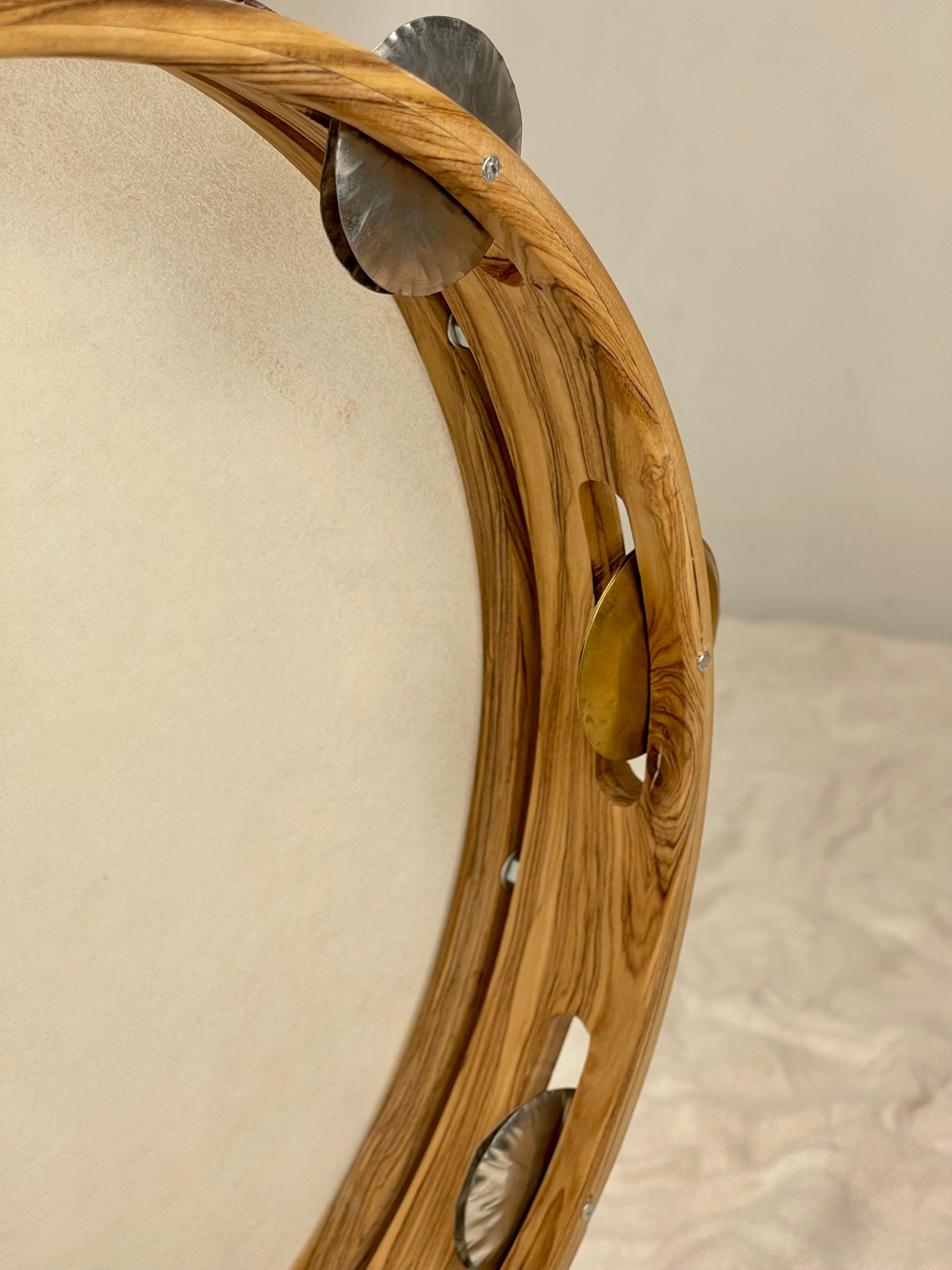 Close-up of interchangeable jingles on 30 cm tambourine frame