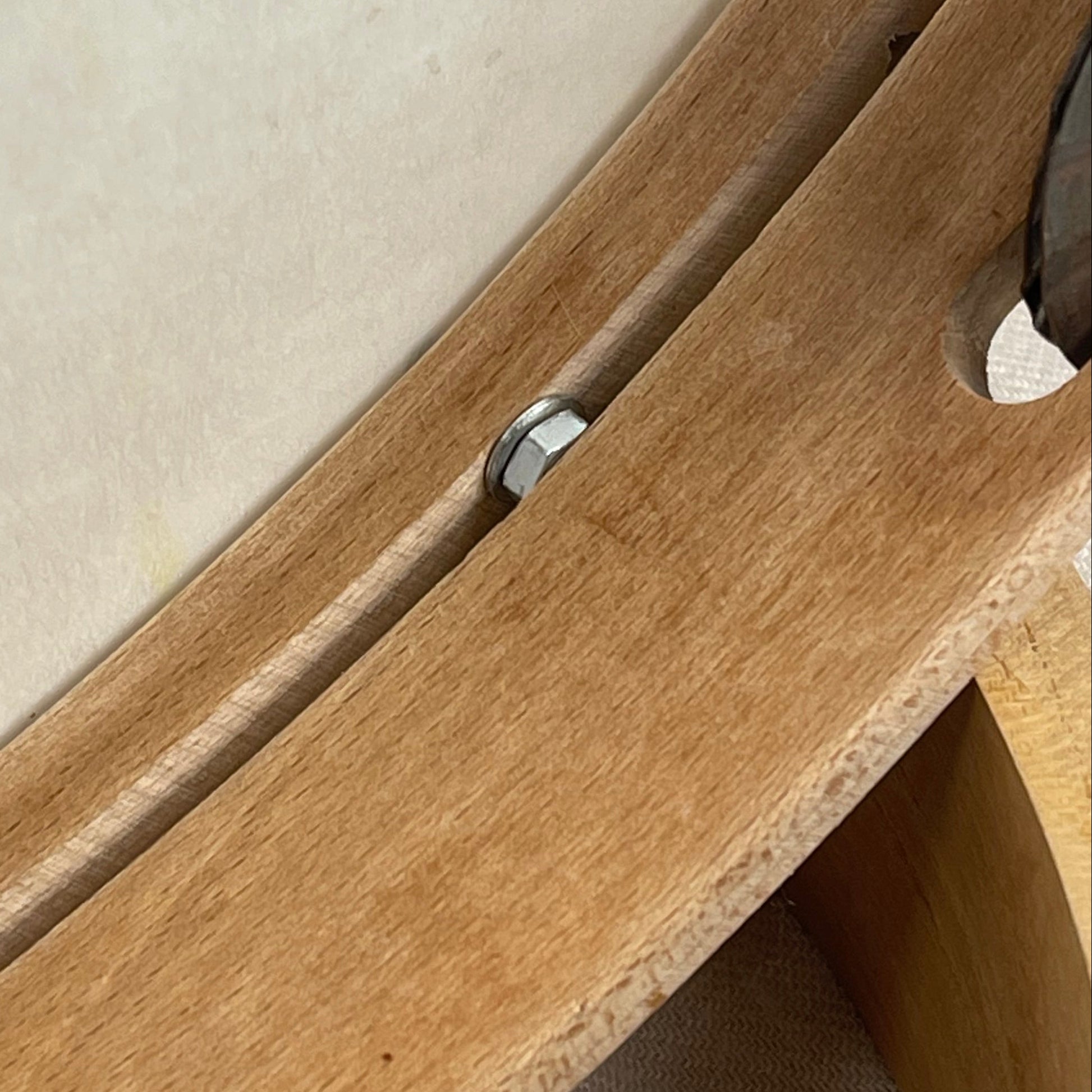 Close-up of white Mylar head and hammered brass jingles