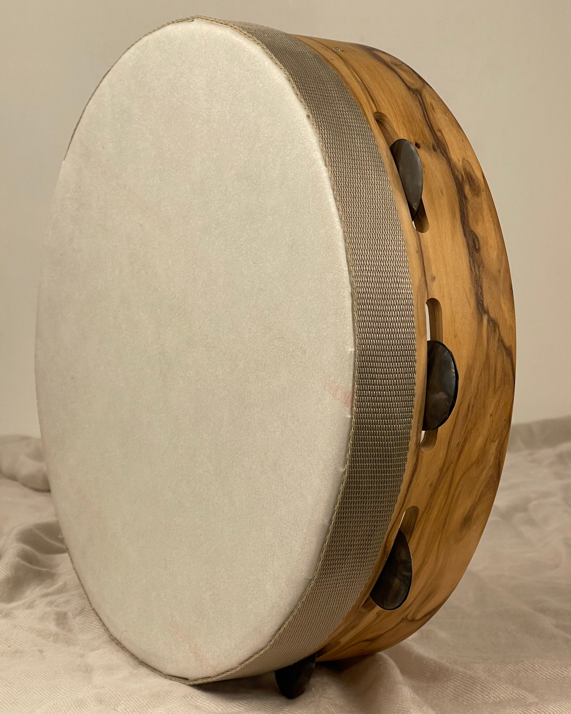 Detail of hammered brass jingles – EUFORIA tambourine