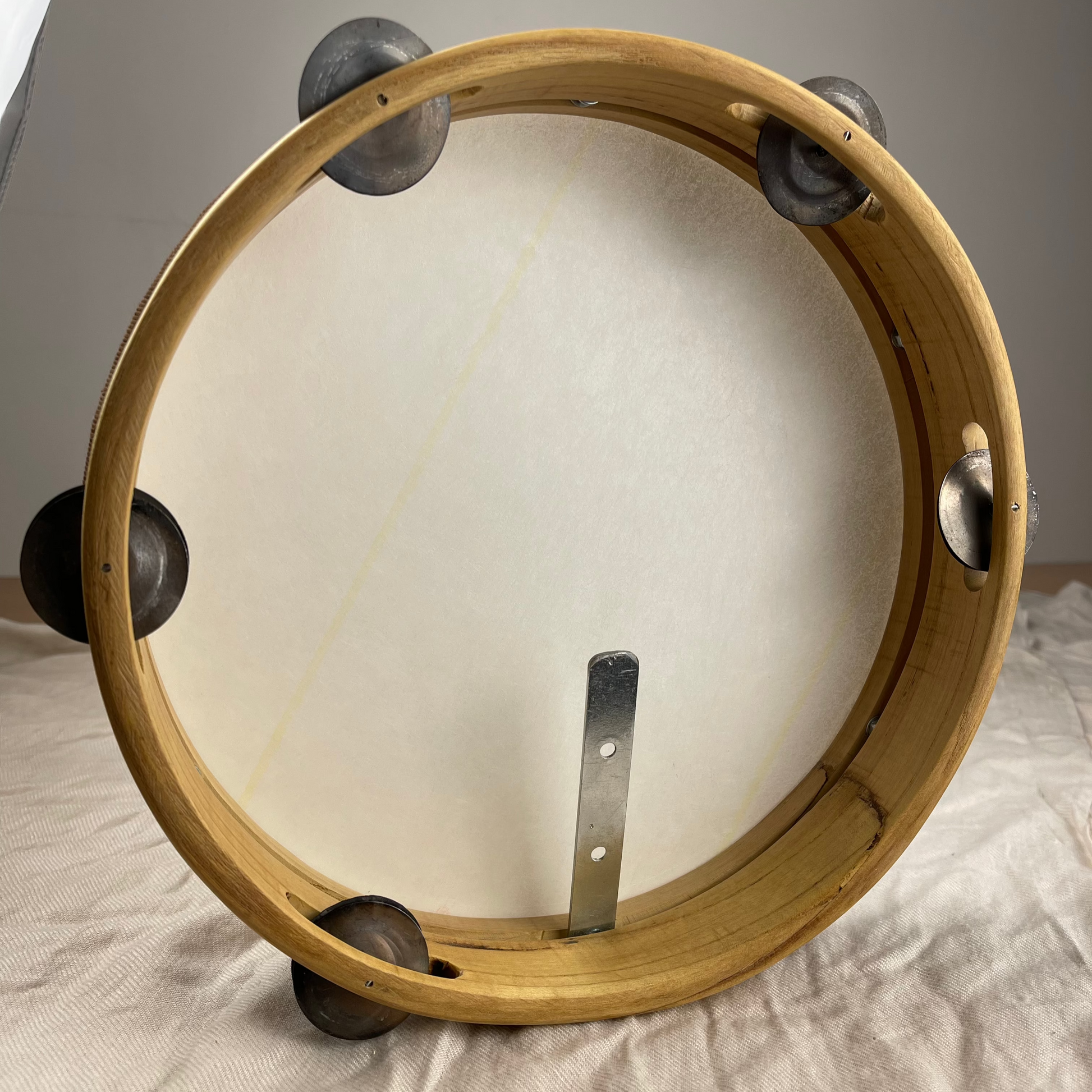 Detail of hammered brass jingles – SPIGA tambourine