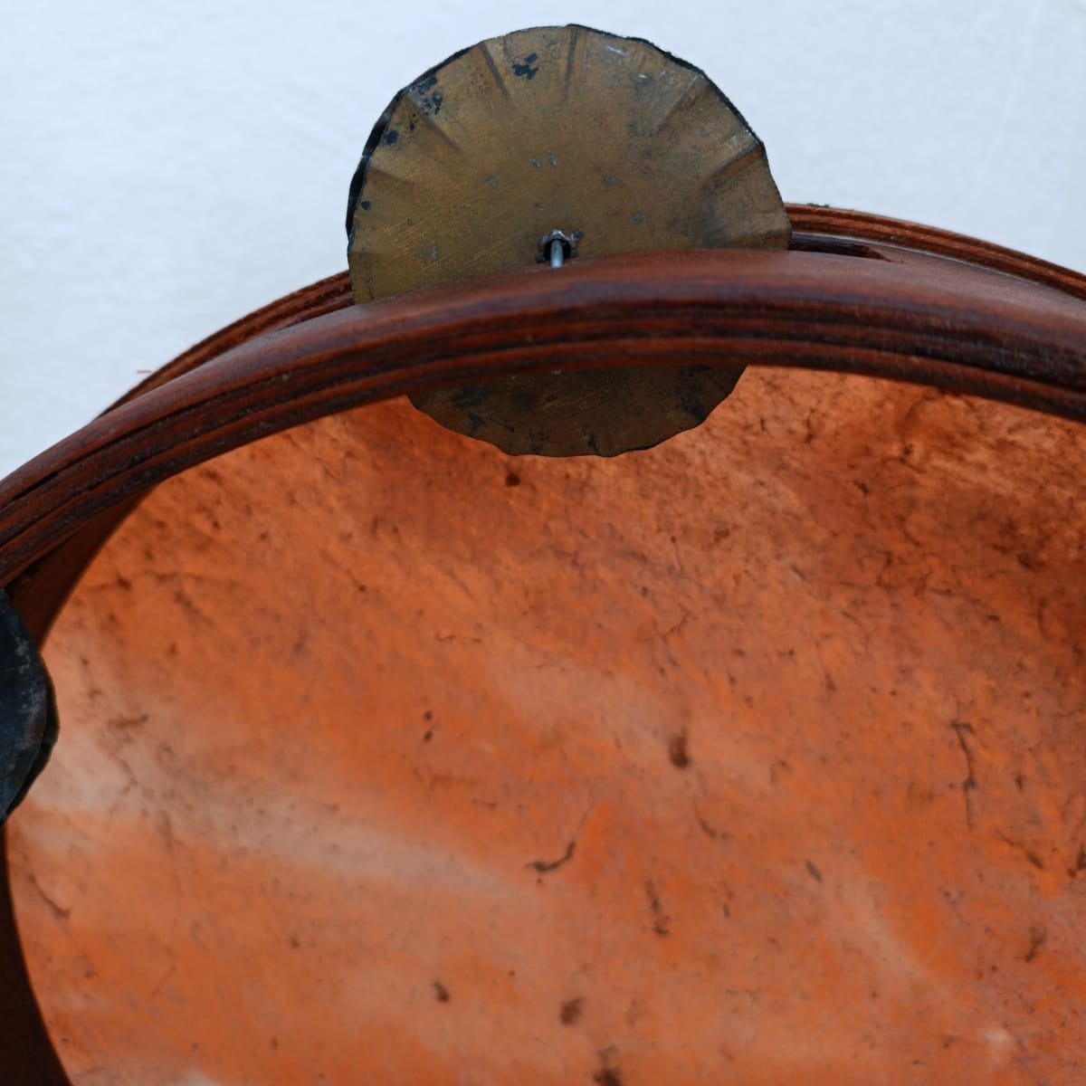 Hand-hammered tin jingles on Calabrian tambourine