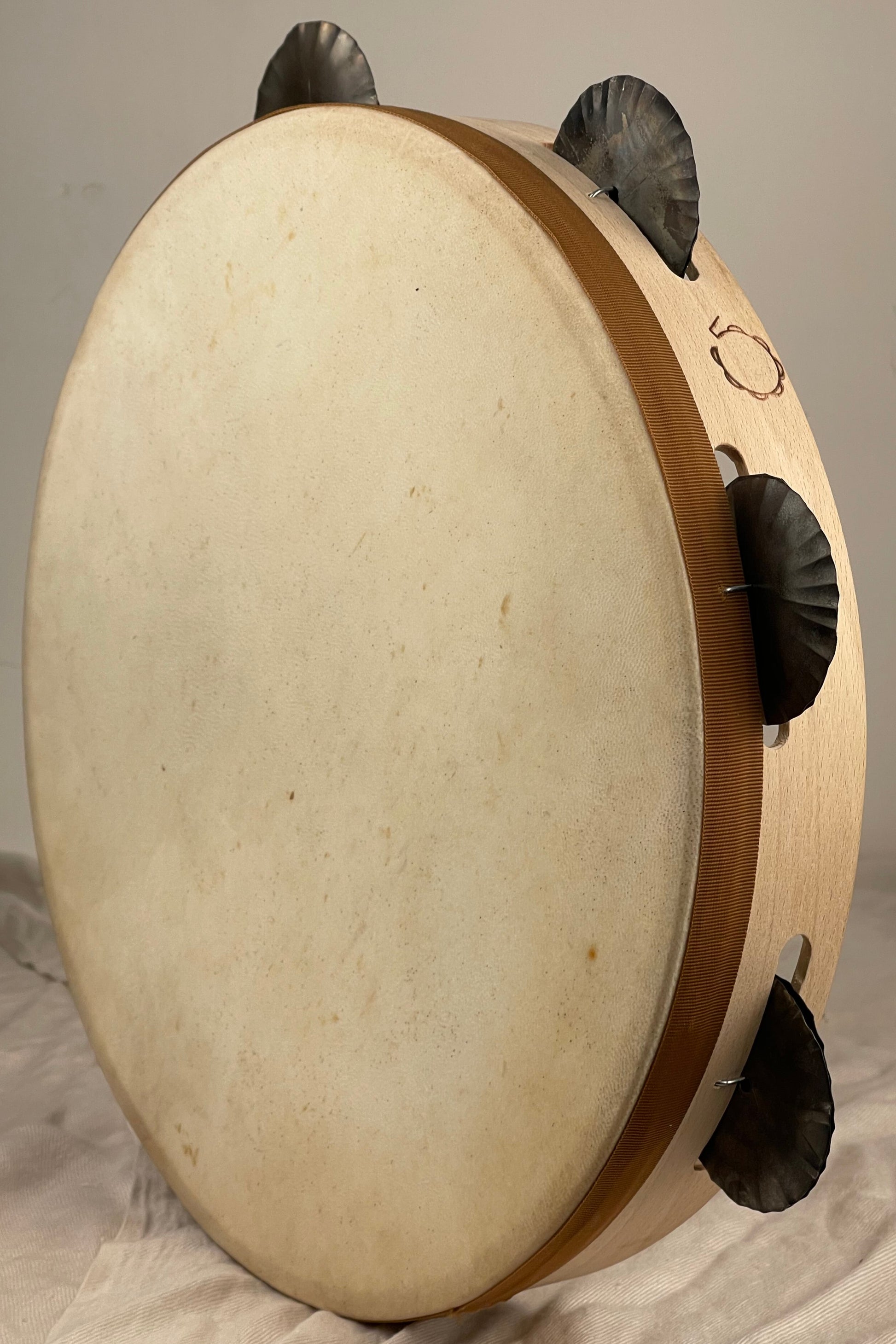 Top view of traditional 14" tambourine for pizzica and tarantella