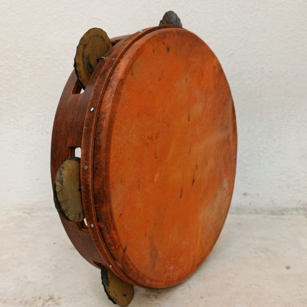 Traditional Calabrian tamburello with red goatskin and tin jingles