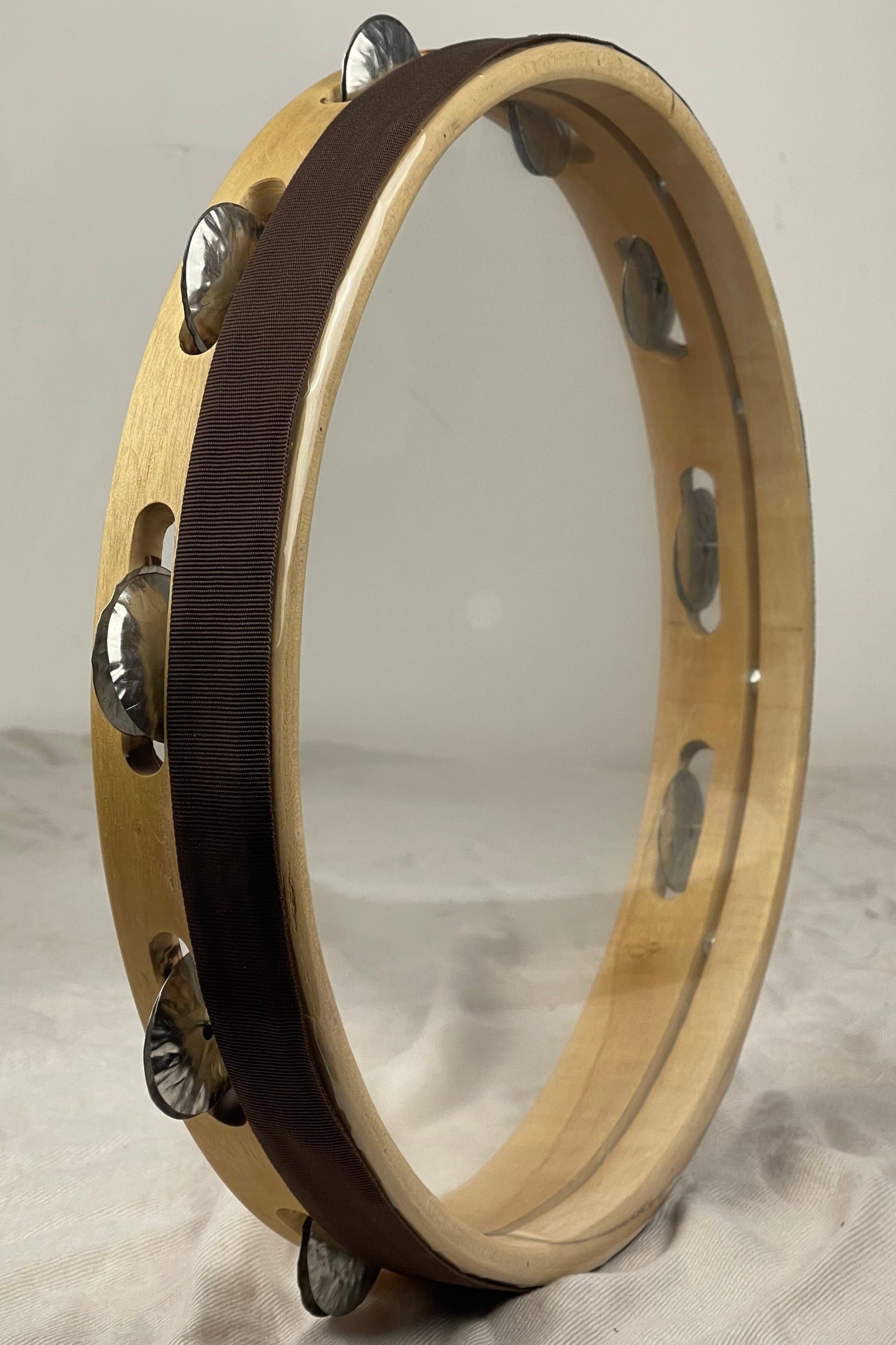 Tuneable tambourine with 9 hand-hammered tin jingles