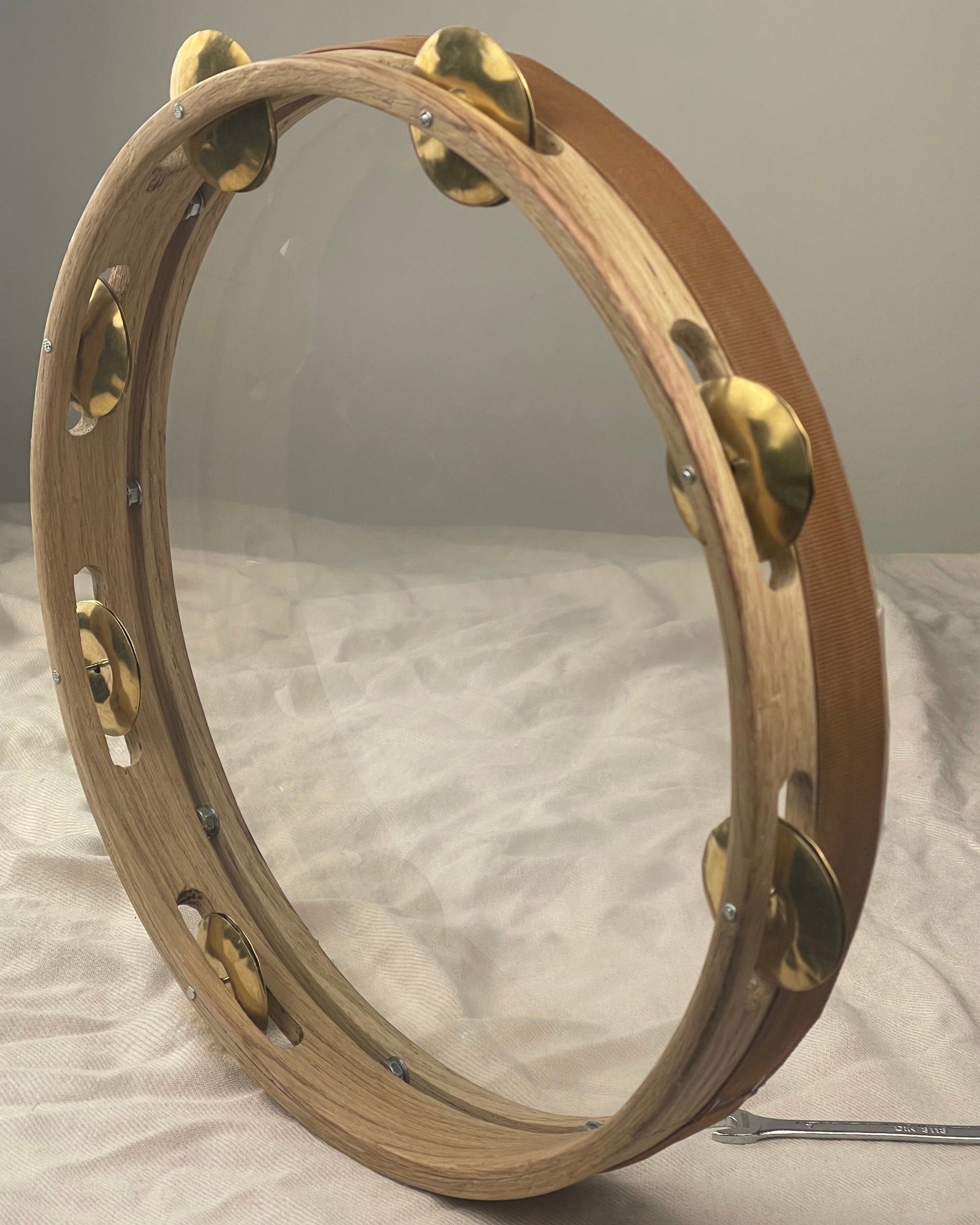 Hex-nut tuning system on the Maestrale tamburello with tuning key in place