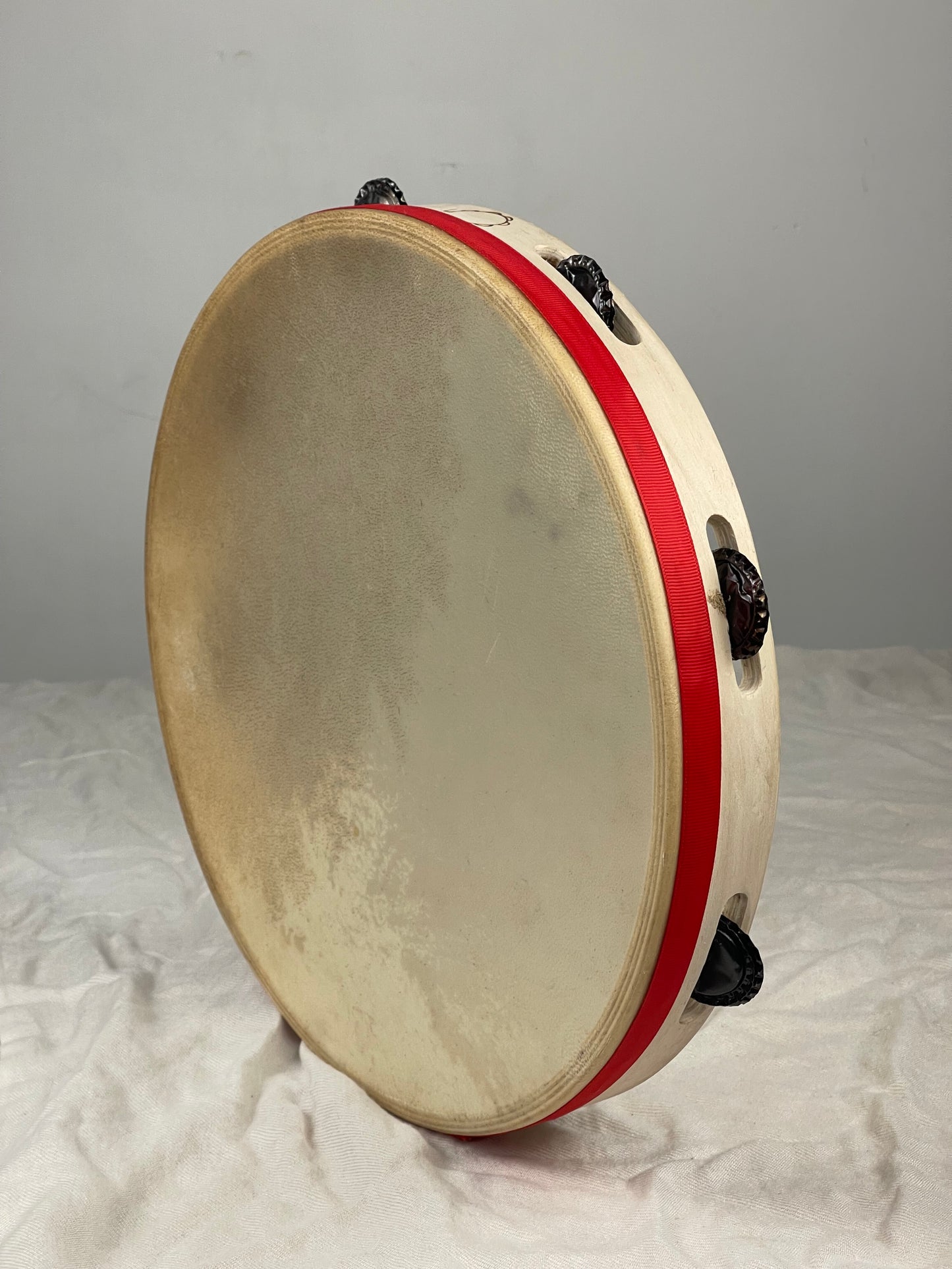 Traditional Tamburello with beer caps jingles